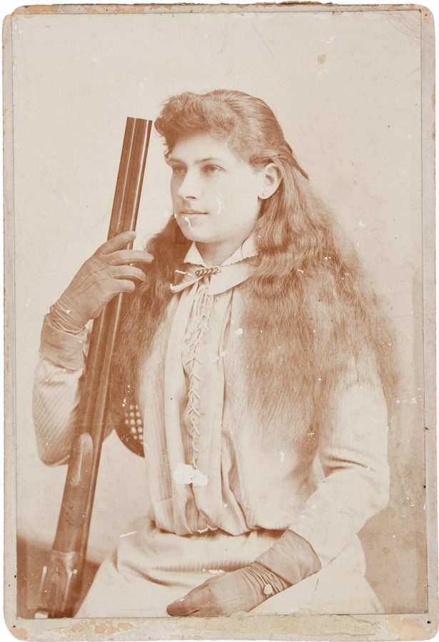 Annie Oakley with shotgun, ca. 1895 – costume cocktail